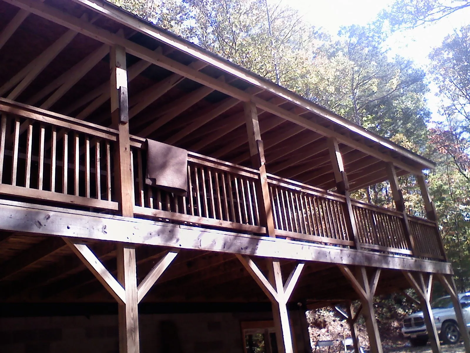 Timber framing under a new elevated porch and deck — Roof Leak Repair in Rock Cave by Roofing Brothers